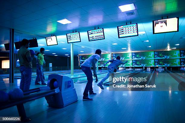 Young afghans bowling at The Strikers, Afghanistan's first bowling alley September 30, 2011 in Kabul, Afghanistan. The Afghan owned bowling alley...