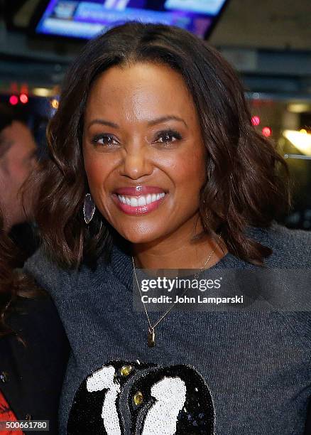 Aisha Tyler of CBS' "The Talk" rings the closing bell at the New York Stock Exchange on December 9, 2015 in New York City.