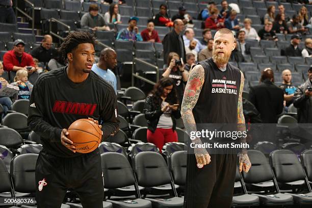 Justise Winslow of the Miami Heat and Chris Andersen of the Miami Heat warm up before the game against the Charlotte Hornets on December 9, 2015 at...