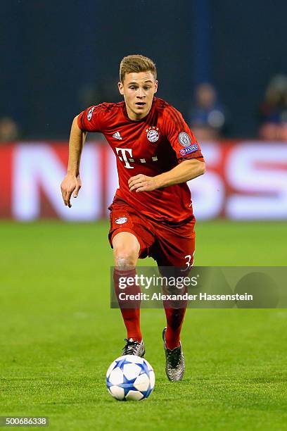 Joshua Kimmich of Muenchen runs with the ball during the UEFA Champions League Group F match between GNK Dinamo Zagreb and FC Bayern Muenchen at...