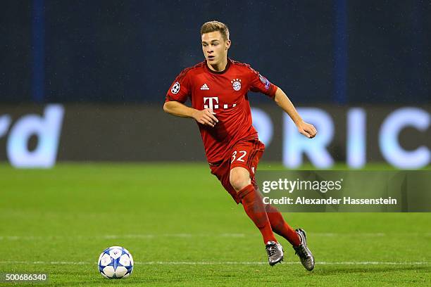 Joshua Kimmich of Muenchen runs with the ball during the UEFA Champions League Group F match between GNK Dinamo Zagreb and FC Bayern Muenchen at...