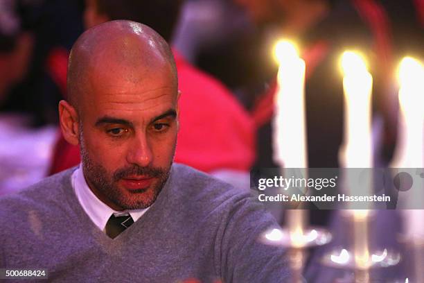 Josep Guardiola, head coach of Bayern Muenchen looks on at the Champions Banquet after the UEFA Champions League Group F match between GNK Dinamo...