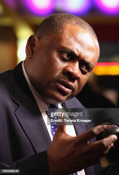 Dr. Bennet Omalu attends the "Concussion" Washington DC Premiere at Regal Cinemas Gallery Place 14 on December 9, 2015 in Washington, DC.