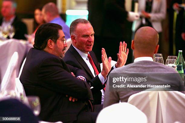 Karl-Heinz Rummenigge , CEO of FC Bayern Muenchen talks to Josep Guardiola, head coach of Bayern Muenchen and Football manager Giovanni Bianchi...