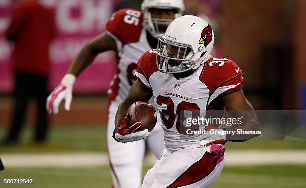 Stepfan Taylor of the Arizona Cardinals runs for yards during the game against the Detroit Lions at Ford Field on October 11, 2015 in Detroit,...