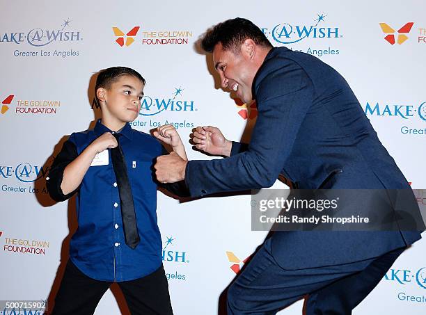 Oscar De La Hoya and "wish kid" arrive at Make-A-Wish Greater Los Angeles honors Oscar De La Hoya, Michael Rosenfeld and Tom Mone at its annual...