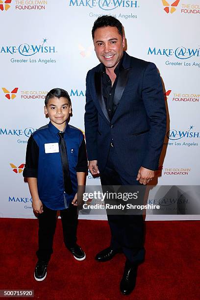 Oscar De La Hoya and "wish kid" arrive at Make-A-Wish Greater Los Angeles honors Oscar De La Hoya, Michael Rosenfeld and Tom Mone at its annual...