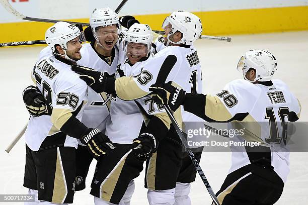 Patric Hornqvist of the Pittsburgh Penguins celebrates his goal against the Colorado Avalanche with Kris Letang, Olli Maatta, Nick Bonino and Eric...