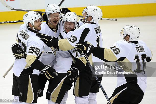 Patric Hornqvist of the Pittsburgh Penguins celebrates his goal against the Colorado Avalanche with Kris Letang, Olli Maatta, Nick Bonino and Eric...