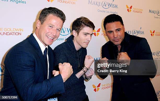 Personality Billy Bush, Travis Flores and Fighter Oscar De La Hoya attend the Make-A-Wish Greater Los Angeles Annual Wishing Well Winter Gala at the...