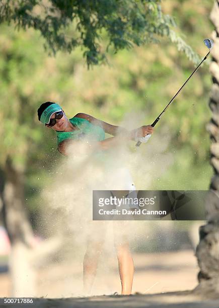 Amy Boulden of Wales plays her fourth shot on the par 5, 10th hole during the second round of the 2015 Omega Dubai Ladies Masters on the Majlis...
