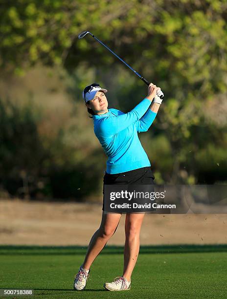 Caroline Masson of Germany plays her fifth shot on the par 5, 10th hole during the second round of the 2015 Omega Dubai Ladies Masters on the Majlis...