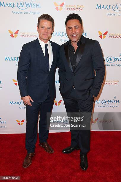 Billy Bush and Oscar De La Hoya arrive at the Make-A-Wish Greater Los Angeles Annual Wishing Well Winter Gala at the Beverly Wilshire Four Seasons...