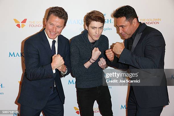 Personality Billy Bush, Travis Flores, and former boxer Oscar Dela Hoya attend the Make-A-Wish Greater Los Angeles Annual Wishing Well Winter Gala at...