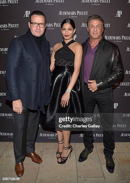 Of Audemars Piguet Francois-Henry Bennahmias, and actors Freida Pinto and Sylvester Stallone attend the Opening of Audemars Piguet Rodeo Drive at...