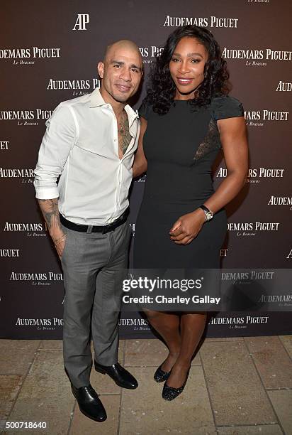 Professional boxer Miguel Cotto and professional tennis player Serena Williams attend the Opening of Audemars Piguet Rodeo Drive at Audemars Piguet...