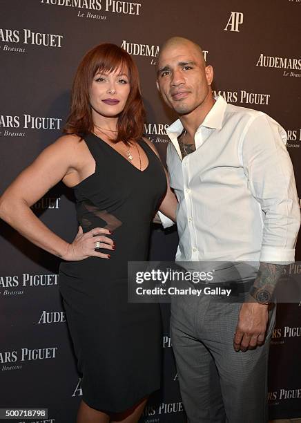 Professional boxer Miguel Cotto and wife Melissa Guzman Cotto attend the Opening of Audemars Piguet Rodeo Drive at Audemars Piguet on December 9,...