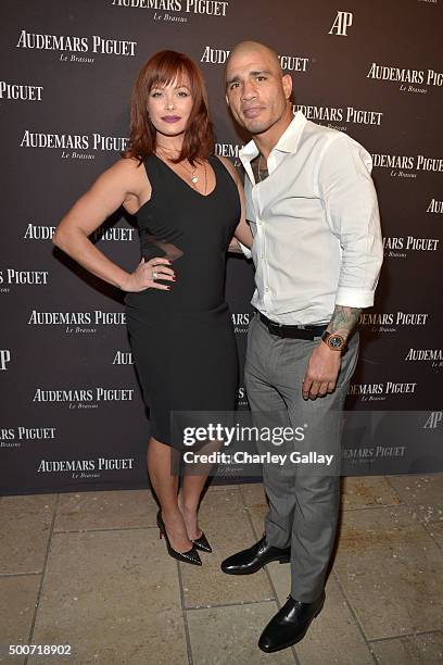 Professional boxer Miguel Cotto and wife Melissa Guzman Cotto attend the Opening of Audemars Piguet Rodeo Drive at Audemars Piguet on December 9,...