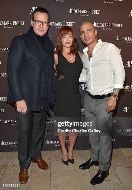 Of Audemars Piguet Francois-Henry Bennahmias, Melissa Guzman Cotto, professional boxer Miguel Cotto attend the Opening of Audemars Piguet Rodeo Drive...