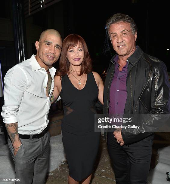 Professional boxer Miguel Cotto, Melissa Guzman Cotto, and actor Sylvester Stallone attend the Opening of Audemars Piguet Rodeo Drive at Audemars...