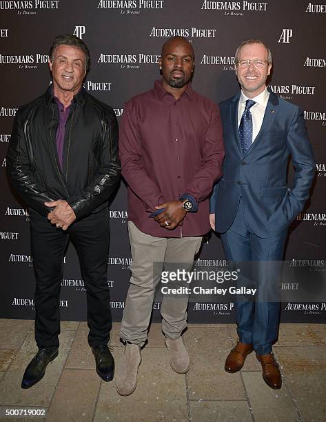 Actor Sylvester Stallone, Corey Gamble, and Xavier Nolot, CEO of Audemars Piguet North America, attend the Opening of Audemars Piguet Rodeo Drive at...