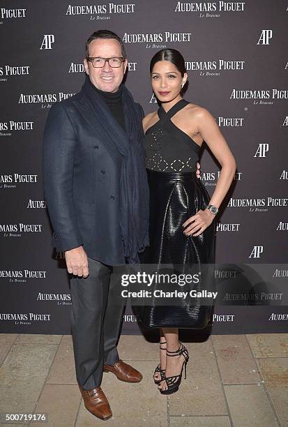 Of Audemars Piguet Francois-Henry Bennahmias and actress Freida Pinto attend the Opening of Audemars Piguet Rodeo Drive at Audemars Piguet on...