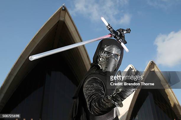 Fans pose at the Star Wars: The Force Awakens fan event at Sydney Opera House on December 10, 2015 in Sydney, Australia.