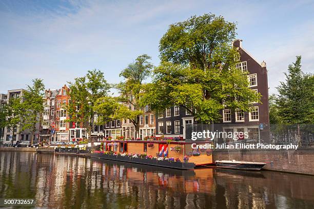 the prinsengracht canal in amsterdam - houseboat stock pictures, royalty-free photos & images