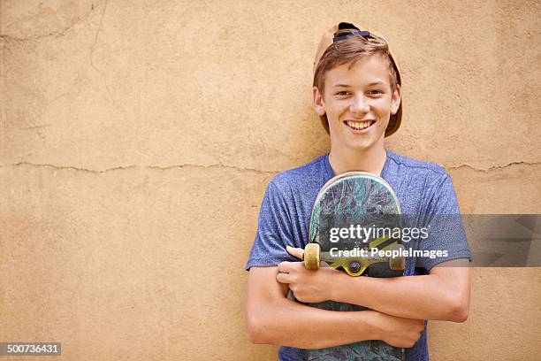 his after-school hobby - handsome teen boy outdoors stock pictures, royalty-free photos & images