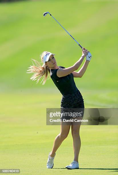Paige Spiranac of the United Statesl plays her third shot on the par 4, first hole during the second round of the 2015 Omega Dubai Ladies Masters on...