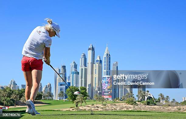 Melissa Reid of England plays her tee shot on the par 4, eighth hole during the second round of the 2015 Omega Dubai Ladies Masters on the Majlis...