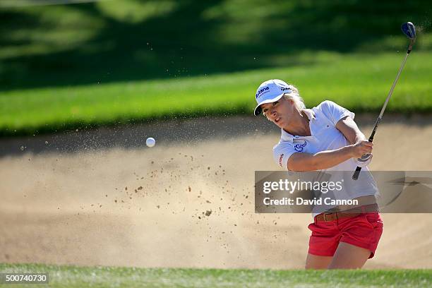 Melissa Reid of England plays her third shot on the par 4, eighth hole during the second round of the 2015 Omega Dubai Ladies Masters on the Majlis...