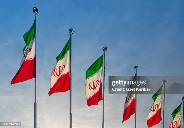iranian flags displayed on streets - iran stockfoto's en -beelden
