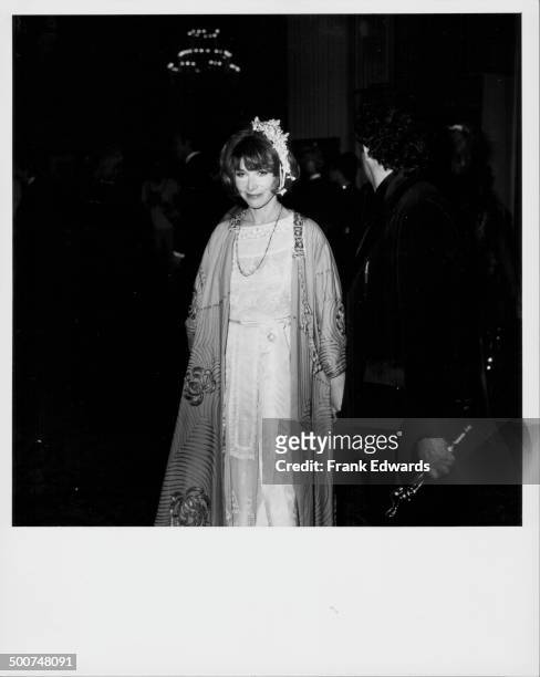 Actress Lee Grant attending the Academy Awards, her husband Joe Feury stands next to her holding her Best Supporting Actress Award, Los Angeles,...