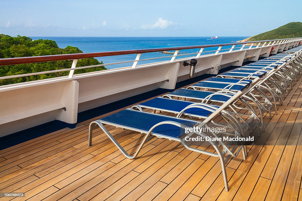 Empty deck chairs on a cruise ship