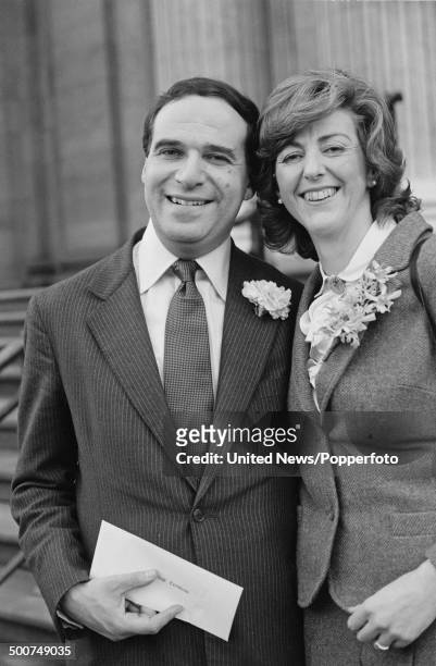 Conservative MP Leon Brittan with his wife, Diana Clemetson, at their wedding, 22nd December 1980.