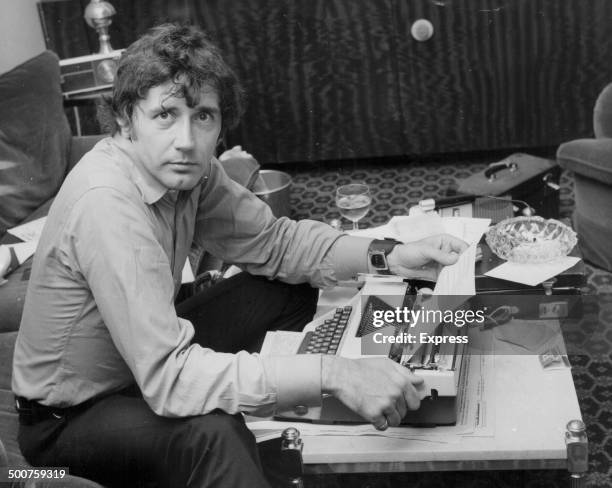 Mickey Deans, husband of the late Judy Garland, beginning to write her biography at a typewriter, London, August 27th 1969.