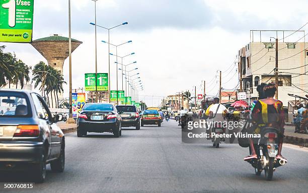 african city traffic - cars on motor way stockfoto's en -beelden