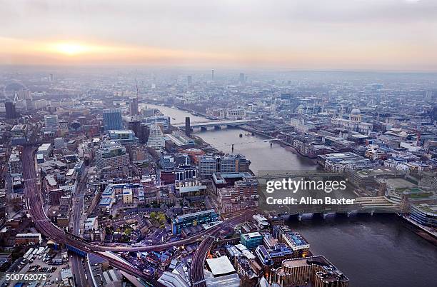 elevated panorama of london at sunset - westend stock pictures, royalty-free photos & images