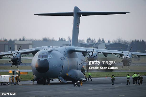 Crews load a Luftwaffe A-400M plane transporting 40 Bundeswehr members and their equipment shortly before takeoff for Incirlik airbase in Turkey as...
