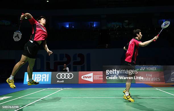 Yong Dae Lee and Yeon Seong Yoo of Korea in action against Mohammad Ahsan and HendraSetiawan of Indonesia in the Men's Doubles match during day two...