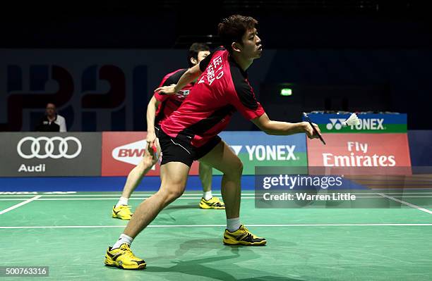 Yong Dae Lee and Yeon Seong Yoo of Korea in action against Mohammad Ahsan and HendraSetiawan of Indonesia in the Men's Doubles match during day two...