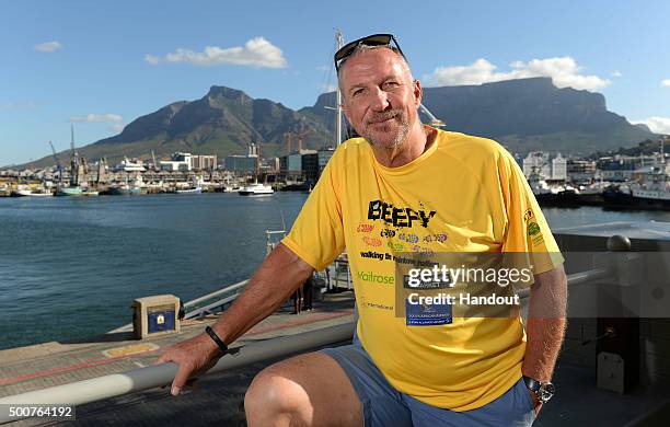 In this handout image provided by Philip Brown, Sir Ian Botham poses in Cape Town on the eve of his latest fundraising walk the 'Beefy Walking the...