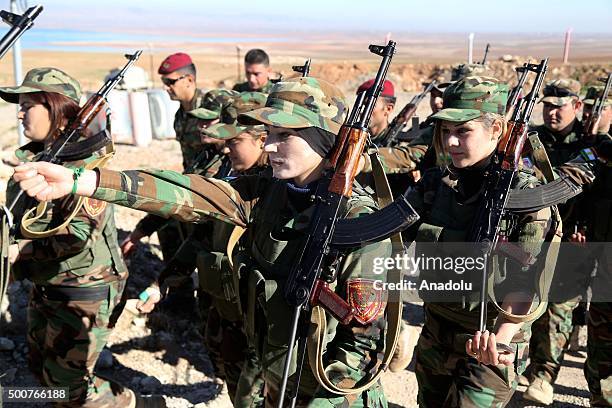 Female Syrian Peshmerga fighters are being trained to fight against Daesh and Assad forces at a camp located in Old Mosul region of the city of...