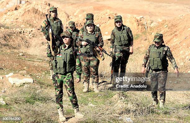 Female Syrian Peshmerga fighters are being trained to fight against Daesh and Assad forces at a camp located in Old Mosul region of the city of...