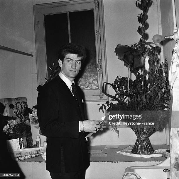 Leader of rock group 'Les Chaussettes Noires' Eddy Mitchell in his dressing room at the Olympia music hall before the concert on May 8, 1963 in...