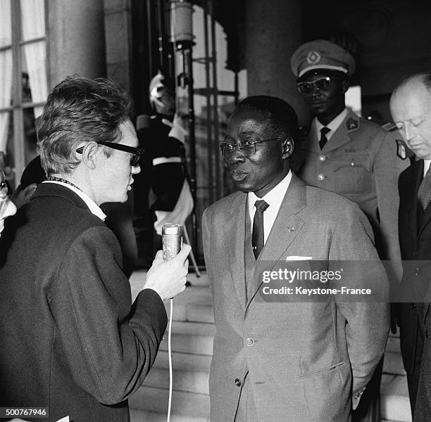 President of Senegal Léopold Sédar Senghor leaves the Elysée Palace after meeting with General de Gaulle on May 27, 1963 in Paris, France.