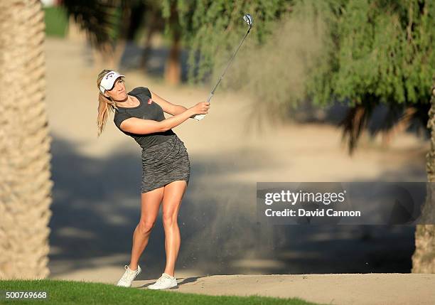 Paige Spiranac of the United States plays her second shot on the par 4, 14th hole during the second round of the 2015 Omega Dubai Ladies Masters on...