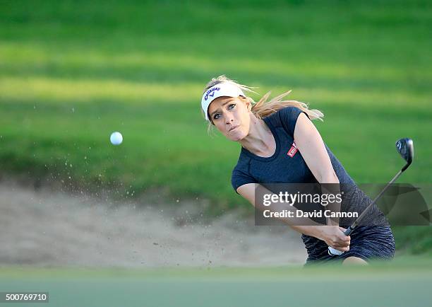 Paige Spiranac of the United States plays her second shot on the par 3, 15th hole during the second round of the 2015 Omega Dubai Ladies Masters on...