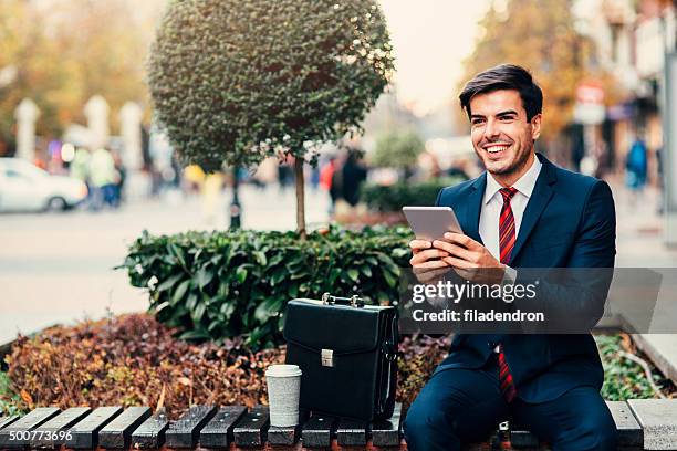 businessman outdoor - red tie stock pictures, royalty-free photos & images